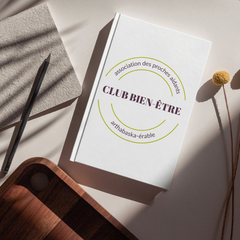 Logo du club bien-être sur un livre